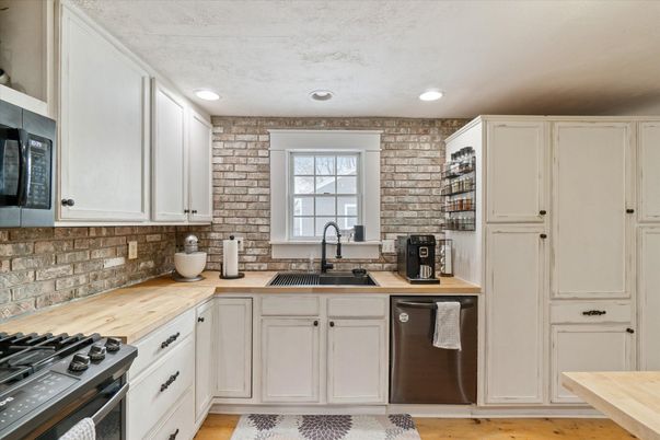 Interior, Kitchen, Recessed Lighting, Stainless Steel Appliances, Stone Walls, Wood Texture Flooring