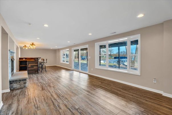 Empty room, Fireplace, Interior, Recessed Lighting, Wood Texture Flooring