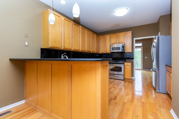 Interior, Kitchen, Pendant Lights, Stainless Steel Appliances, Wood Texture Flooring