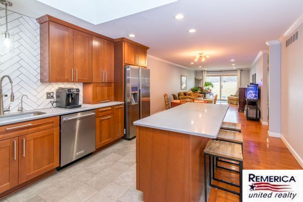 Dining room, Interior, Kitchen, Recessed Lighting, Stainless Steel Appliances, Wood Texture Flooring