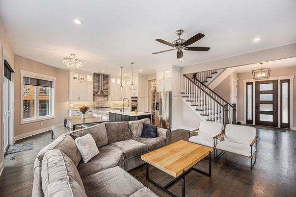 Chandelier, Dining room, Interior, Kitchen, Living room, Pendant Lights, Recessed Lighting, Stainless Steel Appliances, Wood Texture Flooring