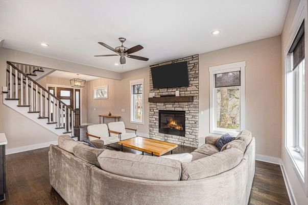 Dining room, Fireplace, Interior, Living room, Pendant Lights, Recessed Lighting, Stone Walls, Wood Texture Flooring