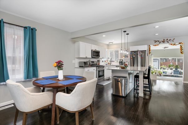 Dining room, Interior, Kitchen, Pendant Lights, Recessed Lighting, Stainless Steel Appliances, Wood Texture Flooring