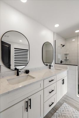 Bathroom, Dual Sink Vanities, Glass Shower, Interior, Recessed Lighting, Wood Texture Flooring
