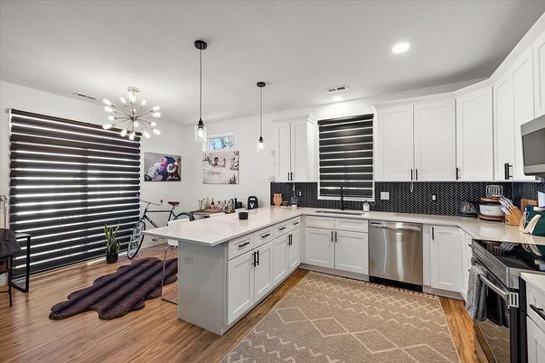 Dining room, Interior, Kitchen, Pendant Lights, Recessed Lighting, Stainless Steel Appliances, Wood Texture Flooring