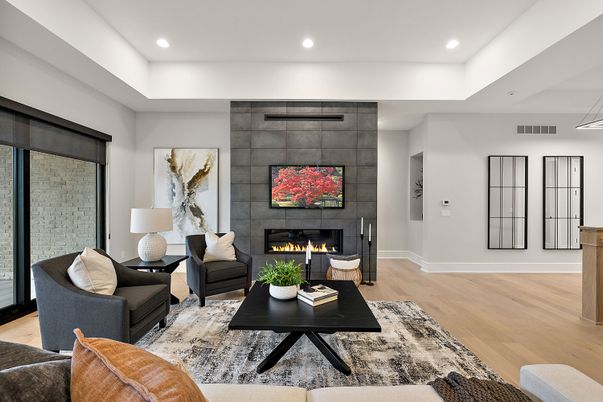 Fireplace, Interior, Living room, Recessed Lighting, Stone Walls, Wood Texture Flooring