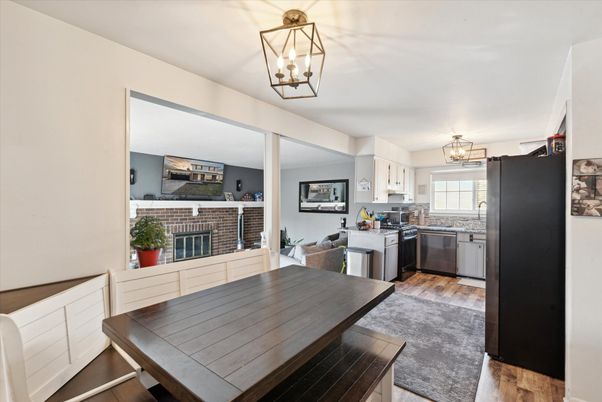 Dining room, Fireplace, Interior, Kitchen, Pendant Lights, Wood Texture Flooring