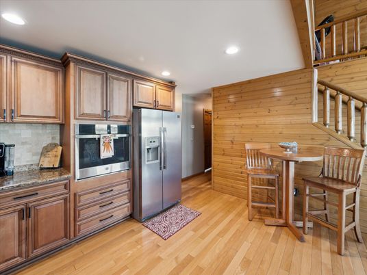 Dining room, Interior, Kitchen, Recessed Lighting, Stainless Steel Appliances, Wood Texture Flooring, Wooden Walls