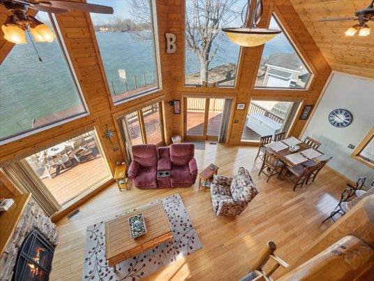 Dining room, Fireplace, Interior, Living room, Water, Wood Texture Flooring