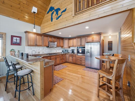 Dining room, Interior, Kitchen, Pendant Lights, Recessed Lighting, Stainless Steel Appliances, Wooden Ceilings, Wood Texture Flooring