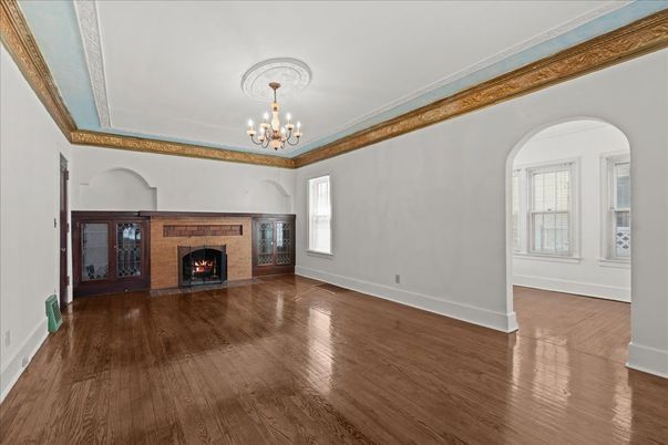 Chandelier, Empty room, Fireplace, Interior, Wood Texture Flooring