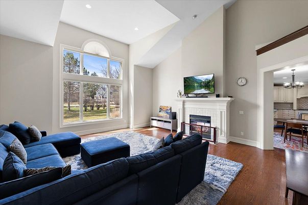 Chandelier, Dining room, Fireplace, Interior, Living room, Recessed Lighting, Wood Texture Flooring