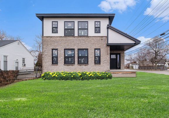 Backyard, Exterior, Facade, Brick Facade, American Foursquare