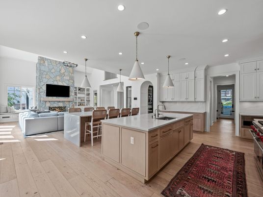 Dining room, Fireplace, Interior, Kitchen, Living room, Pendant Lights, Recessed Lighting, Stainless Steel Appliances, Stone Walls, Wood Texture Flooring