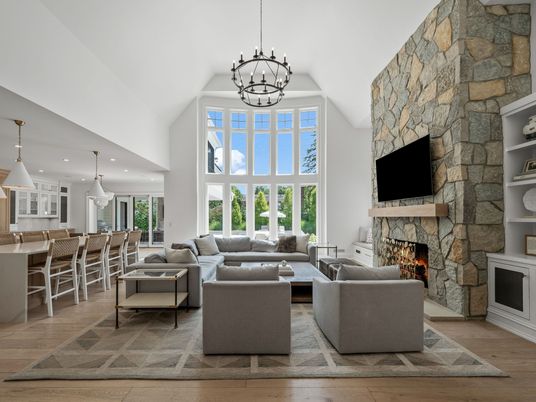 Fireplace, Interior, Living room, Pendant Lights, Recessed Lighting, Stone Walls, Wood Texture Flooring