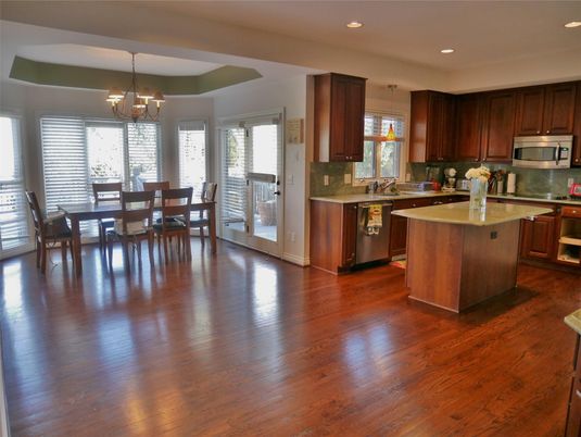 Chandelier, Dining room, Interior, Kitchen, Recessed Lighting, Stainless Steel Appliances, Wood Texture Flooring