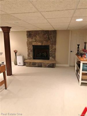 Fireplace, Interior, Recessed Lighting, Stone Walls