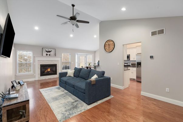 Fireplace, Interior, Kitchen, Living room, Recessed Lighting, Wood Texture Flooring