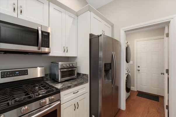 Interior, Kitchen, Stainless Steel Appliances, Washer, Wood Texture Flooring