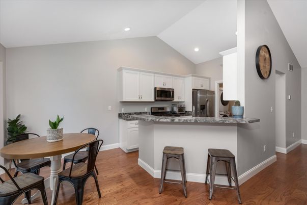 Dining room, Interior, Kitchen, Recessed Lighting, Stainless Steel Appliances, Wood Texture Flooring
