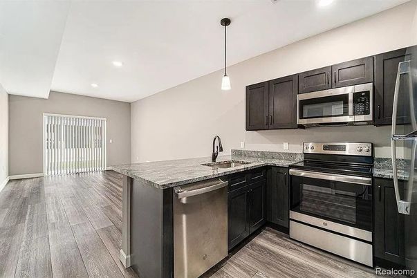 Interior, Kitchen, Pendant Lights, Recessed Lighting, Stainless Steel Appliances, Wood Texture Flooring