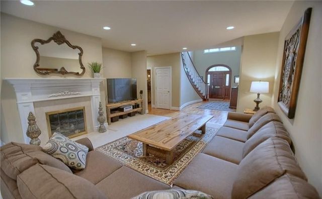 Fireplace, Interior, Living room, Recessed Lighting, Wood Texture Flooring