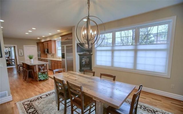 Chandelier, Dining room, Interior, Kitchen, Recessed Lighting, Stainless Steel Appliances, Wood Texture Flooring