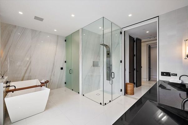 Bathroom, Free Standing Baths, Glass Shower, Interior, Marble Walls, Recessed Lighting