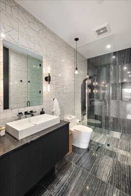 Bathroom, Dual Sink Vanities, Glass Shower, Interior, Marble Walls, Pendant Lights