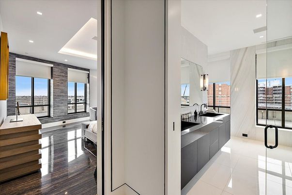 Bathroom, Dual Sink Vanities, Glass Shower, Interior, Recessed Lighting, Water, Wood Texture Flooring