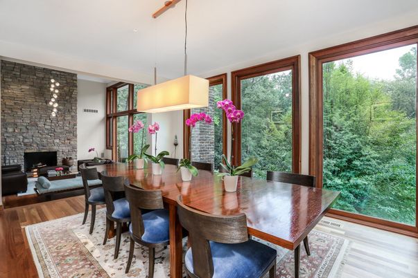 Dining room, Fireplace, Interior, Pendant Lights, Stone Walls, Wood Texture Flooring