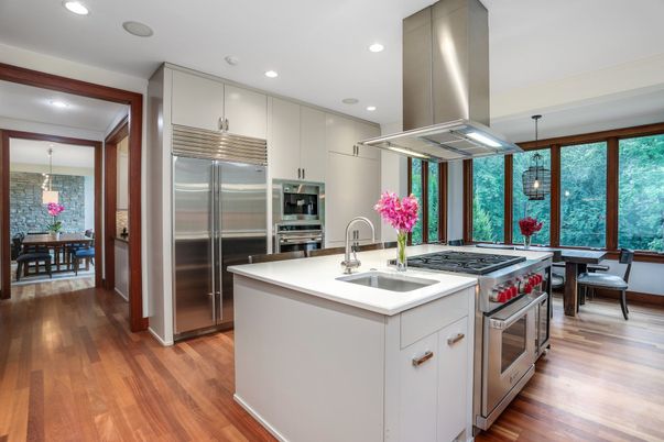 Dining room, Interior, Kitchen, Pendant Lights, Recessed Lighting, Stainless Steel Appliances, Wood Texture Flooring