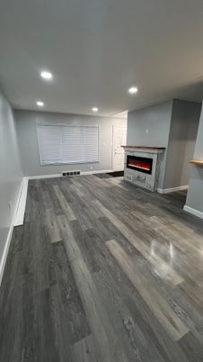 Empty room, Fireplace, Interior, Recessed Lighting, Wood Texture Flooring