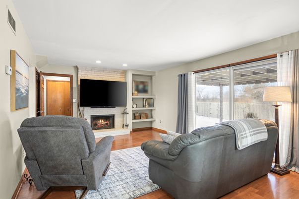 Fireplace, Interior, Living room, Recessed Lighting, Wood Texture Flooring