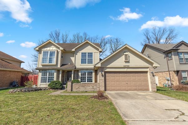 Attached, Exterior, Facade, Brick Traditional