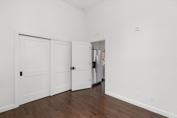 Empty room, Interior, Kitchen, Stainless Steel Appliances, Wood Texture Flooring