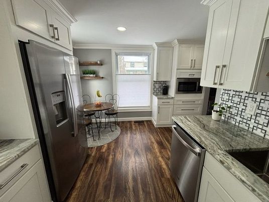 Dining room, Interior, Kitchen, Recessed Lighting, Stainless Steel Appliances, Wood Texture Flooring