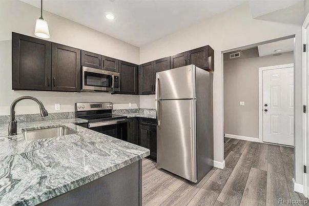 Interior, Kitchen, Pendant Lights, Recessed Lighting, Stainless Steel Appliances, Wood Texture Flooring