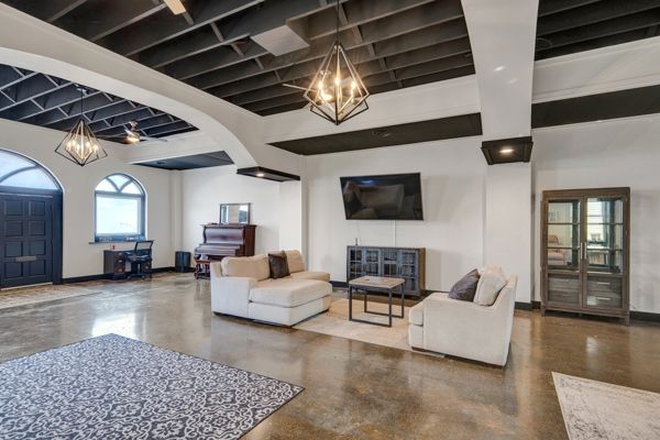 Chandelier, Fireplace, Interior, Living room, Pendant Lights, Piano, Recessed Lighting, Wooden Beams
