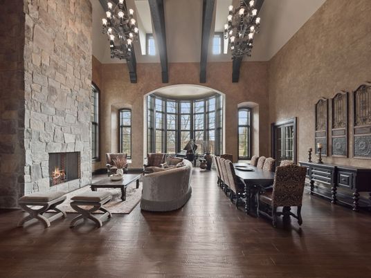 Chandelier, Dining room, Fireplace, Interior, Living room, Pendant Lights, Stone Walls, Wood Texture Flooring