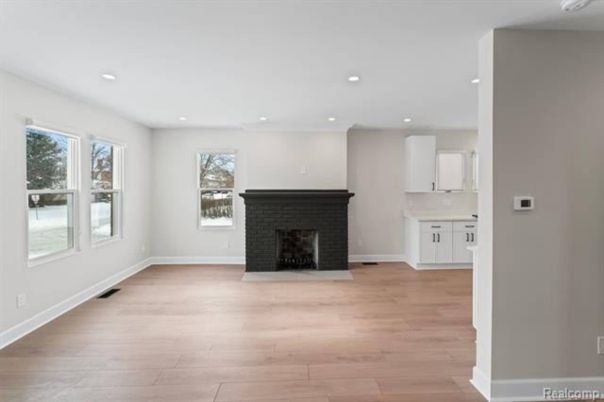 Empty room, Fireplace, Interior, Recessed Lighting, Wood Texture Flooring