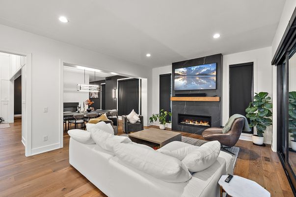 Dining room, Fireplace, Interior, Living room, Pendant Lights, Recessed Lighting, Wood Texture Flooring