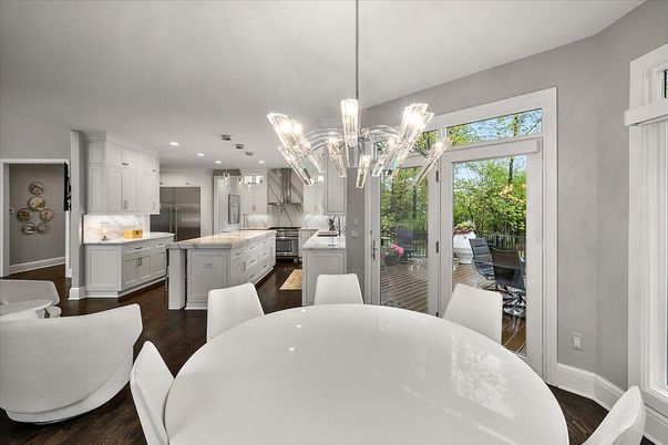Chandelier, Dining room, Interior, Kitchen, Pendant Lights, Recessed Lighting, Stainless Steel Appliances, Wood Texture Flooring