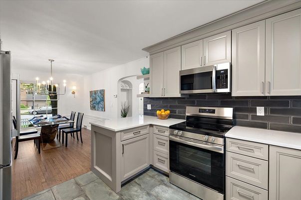 Dining room, Interior, Kitchen, Pendant Lights, Stainless Steel Appliances, Wood Texture Flooring