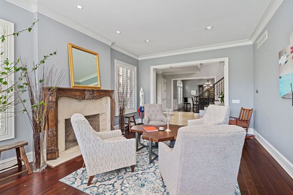 Dining room, Fireplace, Interior, Living room, Piano, Recessed Lighting, Wood Texture Flooring