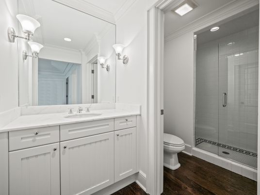 Bathroom, Dual Sink Vanities, Glass Shower, Interior, Recessed Lighting, Wood Texture Flooring