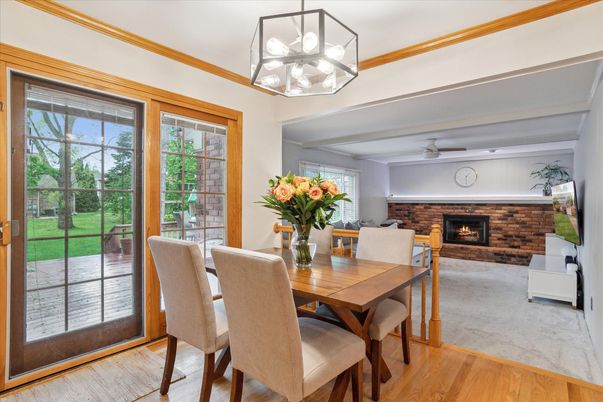 Dining room, Fireplace, Interior, Pendant Lights, Stone Walls, Wood Texture Flooring
