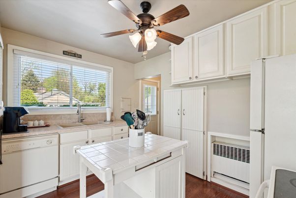 Interior, Kitchen, Tile Countertops, Wood Texture Flooring