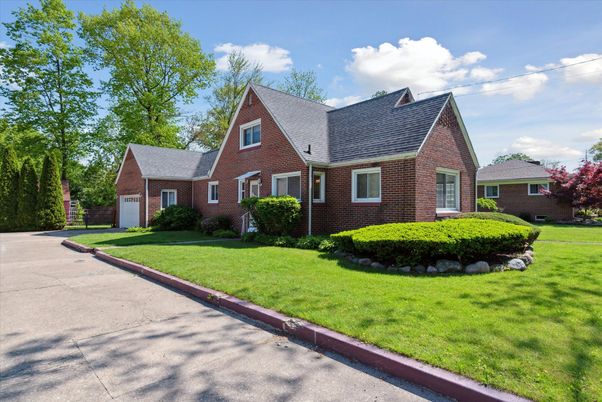 Attached, Exterior, Facade, Brick Facade, Tudor Revival