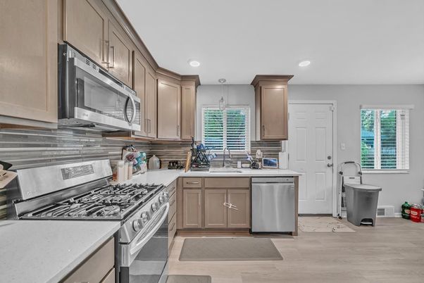 Interior, Kitchen, Recessed Lighting, Stainless Steel Appliances, Wood Texture Flooring